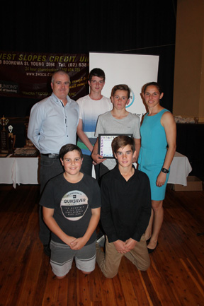 The Sacred Heart junior rugby team with Nicole Begg